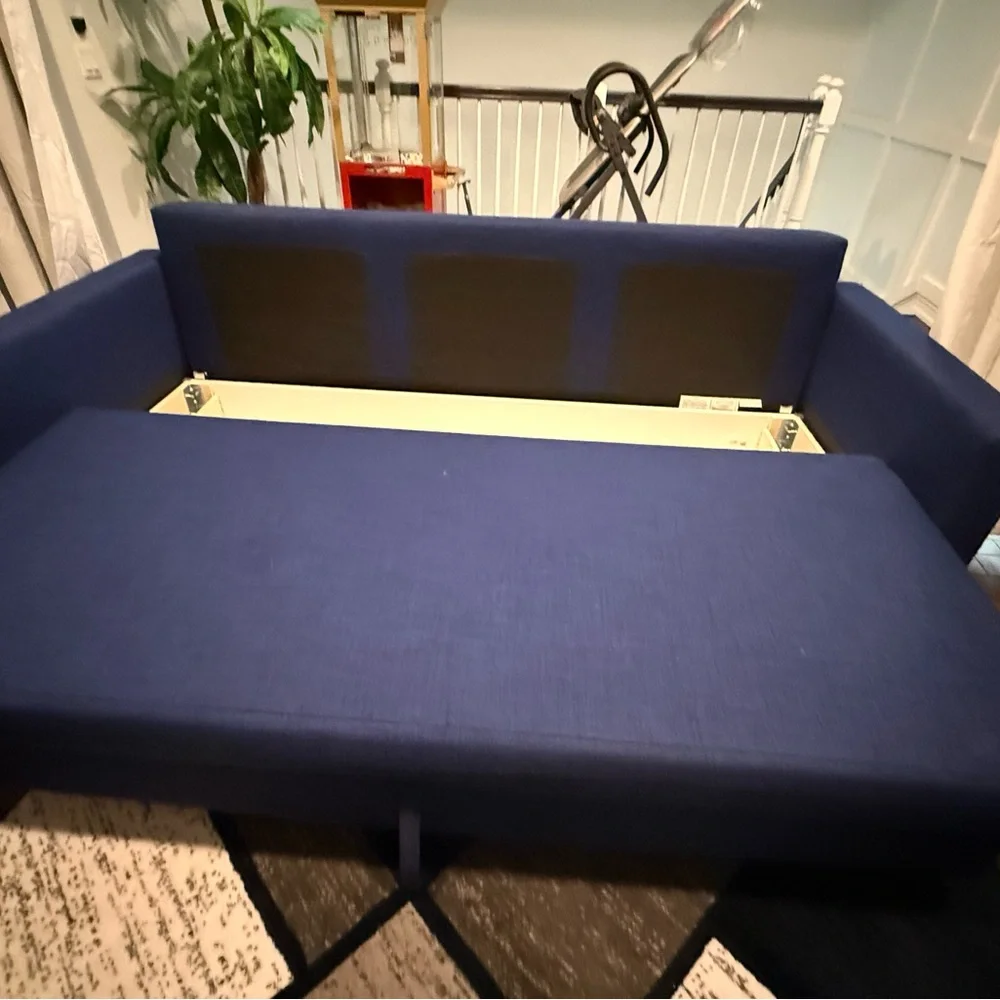 Elegant Blue Sofa sleeper with storage. Pick up only in WPB